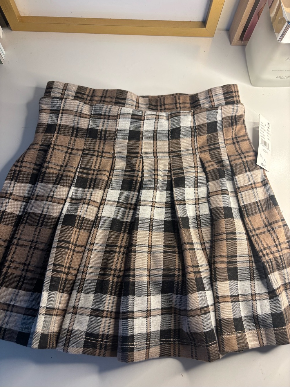 PacSun Plaid Pleated Mini Skirt in Beige, Black, and White